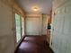 Hallway leading to the kitchen and back deck and features a closet with bi-fold doors at 134 Summer Lake Dr, Dallas, GA 30157
