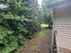View of the side yard between the house and foliage at 134 Summer Lake Dr, Dallas, GA 30157