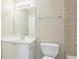 Bright bathroom vanity features a mirror and modern lighting at 1666 Oakbrook Lake Dr, Norcross, GA 30093