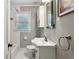 Cozy bathroom featuring a sleek sink, bright white subway tile, and natural light at 1680 Bristol Ne Dr, Atlanta, GA 30329