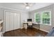 Bedroom with a ceiling fan, hardwood floors, and lots of natural light at 1680 Bristol Ne Dr, Atlanta, GA 30329