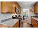 Bright kitchen with granite countertops, stainless appliances, and wooden cabinets at 1680 Bristol Ne Dr, Atlanta, GA 30329