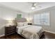 Bedroom featuring hardwood floors, neutral walls, and dual windows at 1680 Bristol Ne Dr, Atlanta, GA 30329