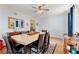 Dining room featuring hardwood floors, large table, and classic decor at 2750 Briarfield Way, Lawrenceville, GA 30043