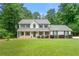Charming two-story home with manicured lawn and lovely landscaping in a desirable neighborhood at 2750 Briarfield Way, Lawrenceville, GA 30043