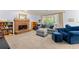 Cozy living room with a brick fireplace, large windows, and comfortable seating at 2750 Briarfield Way, Lawrenceville, GA 30043