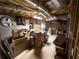 Unfinished basement showing exposed framing, ceiling insulation and ductwork, and storage at 111 Bexley Ln, Douglasville, GA 30134
