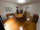 Inviting dining room features wood floors, a wooden dining set, and decor, perfect for Gathering meals at 111 Bexley Ln, Douglasville, GA 30134