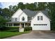 Charming two-story home with a well-maintained lawn and attached two car garage at 111 Bexley Ln, Douglasville, GA 30134