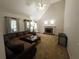 Spacious living room featuring a fireplace, high ceilings, and large windows at 111 Bexley Ln, Douglasville, GA 30134