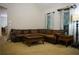 Comfortable living space with a sectional sofa, area rug, and natural lighting at 111 Bexley Ln, Douglasville, GA 30134
