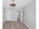 Bright bedroom with sleek ceiling fan and neutral gray walls at 109 Rockefeller Ln, Dallas, GA 30157