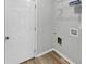 The laundry room has built in shelving and utility connections at 109 Rockefeller Ln, Dallas, GA 30157
