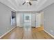 Sun-filled bedroom showing hardwood floors and ensuite bathroom access at 109 Rockefeller Ln, Dallas, GA 30157
