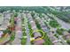 Real estate aerial view shows the property within a suburban neighborhood, highlighting community layout at 4495 Hedgewood Dr, Cumming, GA 30041