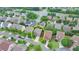 Neighborhood aerial view showcasing property's location within a residential community with tree lined streets at 4495 Hedgewood Dr, Cumming, GA 30041