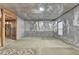 Unfinished basement with vapor barrier, drop ceiling, and concrete foundation at 4495 Hedgewood Dr, Cumming, GA 30041