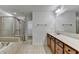 Bathroom with walk-in shower, tub, and double vanity at 4495 Hedgewood Dr, Cumming, GA 30041