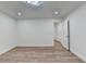 Bedroom featuring wood floors, recessed lighting, and white trim at 4495 Hedgewood Dr, Cumming, GA 30041