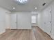 Bedroom with white walls and trim, recessed lights, and a window at 4495 Hedgewood Dr, Cumming, GA 30041
