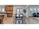 Cozy dining area adjacent to the kitchen, featuring hardwood floors and ample natural light at 4495 Hedgewood Dr, Cumming, GA 30041