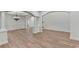 Elegant dining room with hardwood floors, wainscoting, and a decorative chandelier at 4495 Hedgewood Dr, Cumming, GA 30041