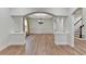 Dining room with hardwood floors, white walls, and an elegant chandelier at 4495 Hedgewood Dr, Cumming, GA 30041