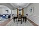 Open concept view of a dining and living space with hardwood floors and modern decor at 4495 Hedgewood Dr, Cumming, GA 30041