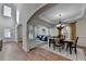 Open-concept foyer leads to the dining area and living room with abundant natural light at 4495 Hedgewood Dr, Cumming, GA 30041