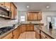Well-equipped kitchen with granite countertops, stainless steel appliances, and a convenient island with bar seating at 4495 Hedgewood Dr, Cumming, GA 30041