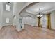Bright living room with an open floor plan, hardwood floors, and lots of natural light at 4495 Hedgewood Dr, Cumming, GA 30041