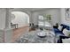 Spacious living room with hardwood floors, plantation shutters, and elegant decor at 4495 Hedgewood Dr, Cumming, GA 30041