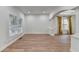 Spacious living room with hardwood floors, plantation shutters, and elegant trim at 4495 Hedgewood Dr, Cumming, GA 30041