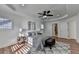 Bedroom featuring a ceiling fan, hardwood flooring, and natural light at 4495 Hedgewood Dr, Cumming, GA 30041