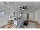 Bedroom featuring a ceiling fan, hardwood flooring, and natural light at 4495 Hedgewood Dr, Cumming, GA 30041
