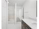 Bright bathroom with updated vanity and shower at 1105 Pine Heights Ne Dr, Atlanta, GA 30324