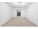 A bright, spacious bedroom offers a window view and modern ceiling fan; ready for a new homeowner at 1105 Pine Heights Ne Dr, Atlanta, GA 30324