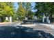 Gated entrance with decorative fountain and manicured landscaping offers privacy and curb appeal at 1105 Pine Heights Ne Dr, Atlanta, GA 30324