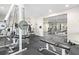 Weightlifting area of the on-site gym featuring weight machines and rubber floor at 1105 Pine Heights Ne Dr, Atlanta, GA 30324