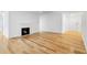 Inviting living area offering hardwood floors, a charming fireplace, and a bright, airy feel at 1105 Pine Heights Ne Dr, Atlanta, GA 30324