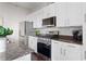 Well-equipped kitchen with stainless steel appliances, granite countertops, and ample cabinet space at 1195 Milton Se Ter # 5101, Atlanta, GA 30315