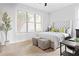 Serene bedroom with large windows, plush carpeting, and a comfortable upholstered bed at 1195 Milton Se Ter # 5101, Atlanta, GA 30315