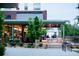 Outdoor dining space with seating and surrounding greenery at 1195 Milton Se Ter # 5101, Atlanta, GA 30315