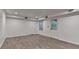 Basement with tile floors and an exit door at 2530 Ashbourne Dr, Lawrenceville, GA 30043