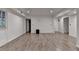 Large basement area with tile floors, recessed lighting, and white walls at 2530 Ashbourne Dr, Lawrenceville, GA 30043