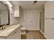 Bathroom with shower, vanity, mirror, and door at 2530 Ashbourne Dr, Lawrenceville, GA 30043
