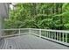 Second story deck overlooking lush wooded property at 2530 Ashbourne Dr, Lawrenceville, GA 30043