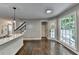 Lovely kitchen with granite countertops, stainless steel sink, and natural light from a large window at 2530 Ashbourne Dr, Lawrenceville, GA 30043