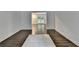 Large living room with hardwood floors connecting to back porch at 2530 Ashbourne Dr, Lawrenceville, GA 30043