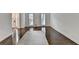 Bright living room with hardwood floors, white walls, and plenty of natural light at 2530 Ashbourne Dr, Lawrenceville, GA 30043